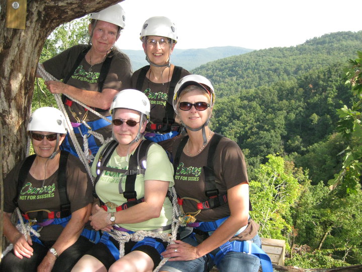 A group of beautiful gal pals give us a smile on the zip line.