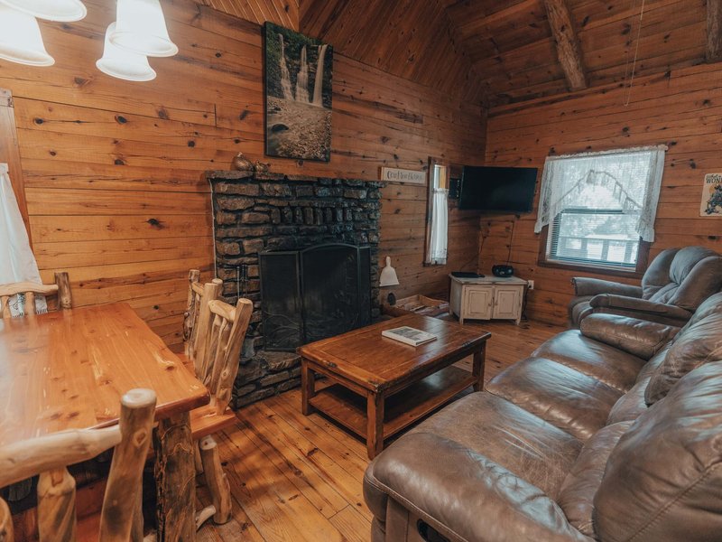 Living room with nativestone fireplace, Ponca Cabin 1