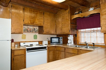 The kitchen in the Mills Cabin is roomy and has a large food prep counter.