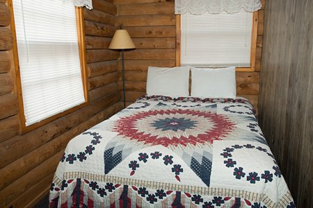 A full-size bed sleeping area is located on the main floor.