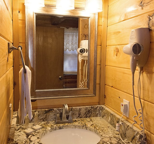 The pretty vanity area of the Songbird's bathroom.