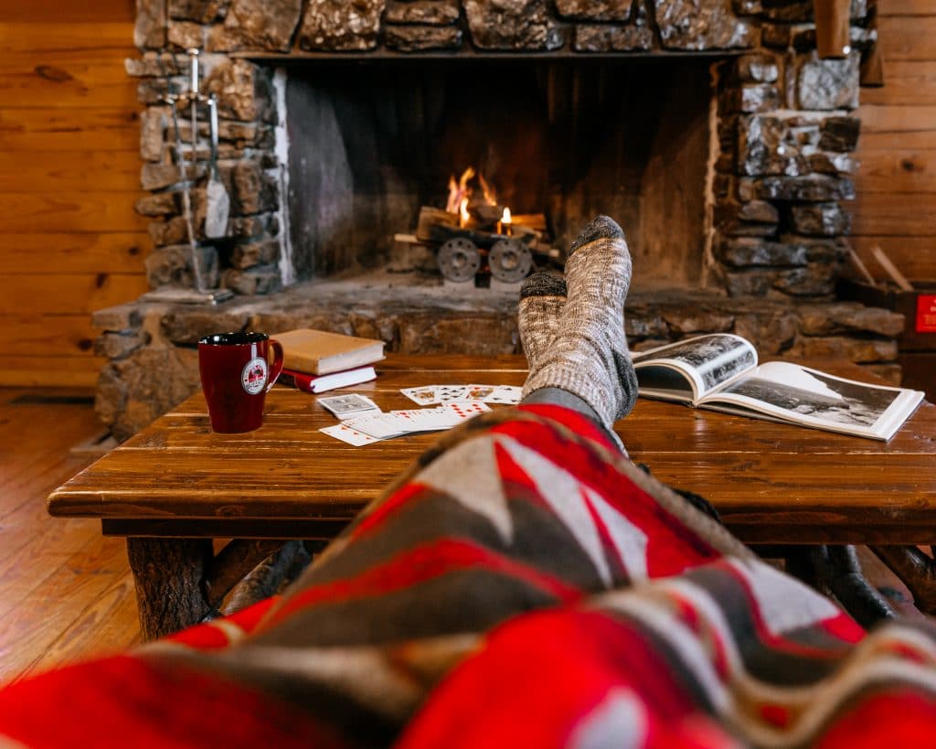 Fireplace scene at a cozy Buffalo Outdoor Center cabin in Ponca, Arkansas.