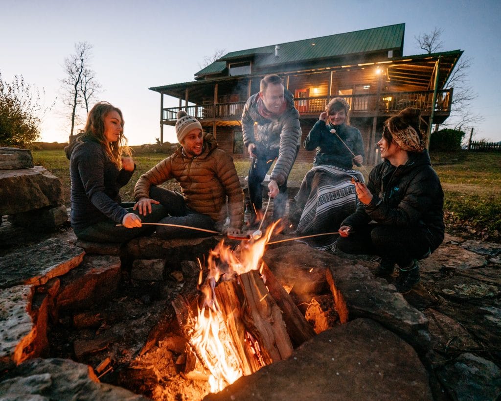 Group campfire fun at the Big Sky Cabin on the mountains above Ponca.