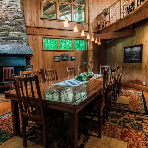 A 14-person, custom-built table graces the lodge's formal dining area