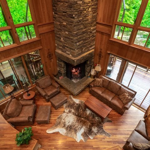 Ponca Creek Lodge features a gorgeous, open living area with a fantastic nativestone fireplace as its focal point.