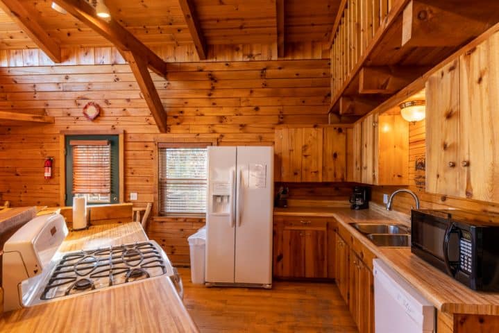 Family meal prep is a snap in the spacious, fully-appointed kitchen of the Compton Mountain Cabin.