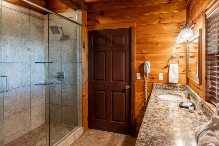 Cabin X bathroom with tile shower