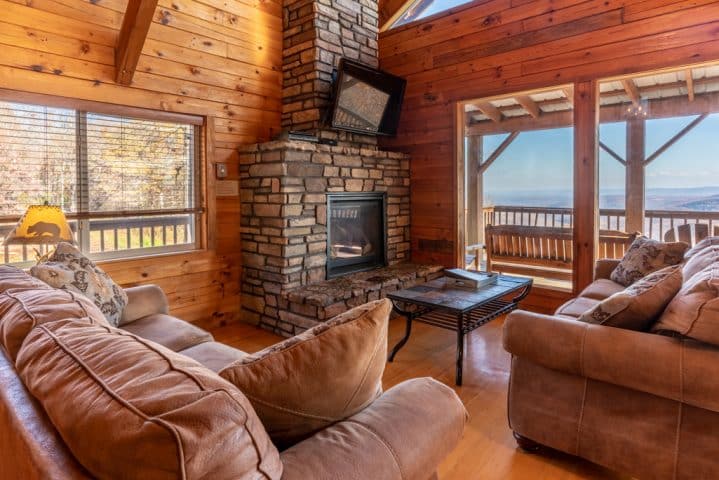 Spacious comfort awaits your family or friends in the Compton Mountain Cabin with its large living area, featuring a gas fireplace.