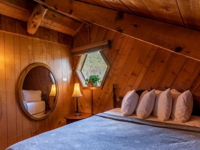 The Queen bed in the Buffalo River Cabin loft