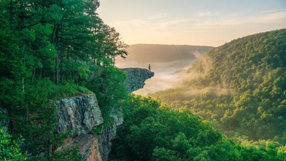 Sunrise and hiker at Whitaker Point