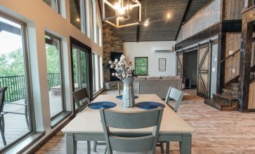 A beautiful dining area with a view across the Ponca Wilderness awaits you at the Wildwood Cabin.