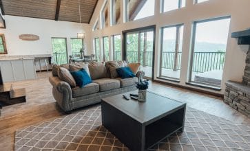 The fabulous, window-studded living area of the WIldwood Cabin gives your family or friends plenty of room to relax.