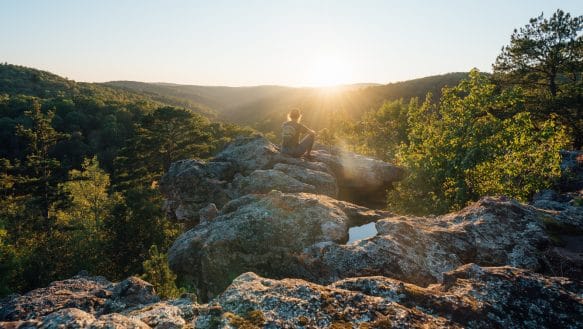 A hiker taking in the view from Pedestal Rocks Scenic Area