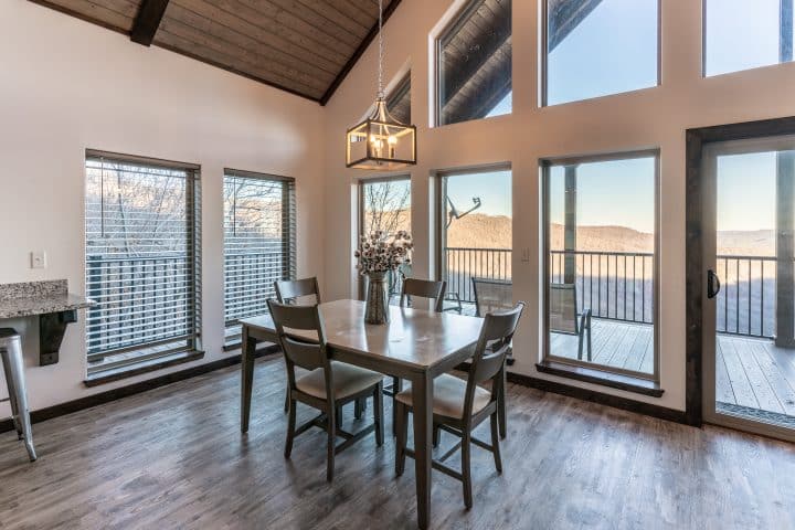 A beautiful dining area with a view across the Ponca Wilderness awaits you at the Wildwood Cabin.
