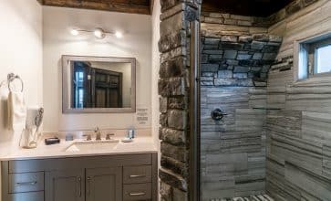 The Wildwood Cabin features a unique bathroom with waterfall shower.
