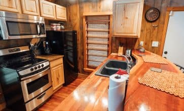 You'll enjoy a fully-appointed kitchen in the Creekside Cabin.