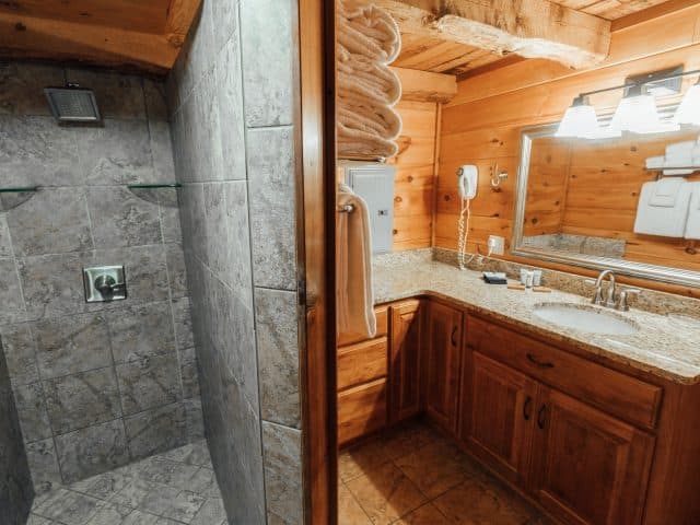 The Balloon Cabin features a modern showerbath, appointed with a large, beautiful tile walk-in shower.