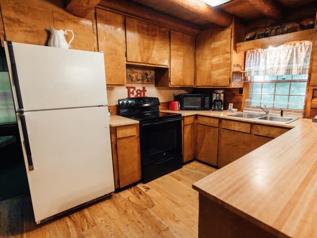 Enjoy a fully-appointed kitchen in the Mills Cabin.