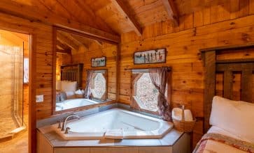 The Valley Dream Cabin has a romantic bedside jacuzzi tub for two.