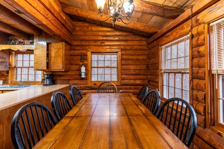 The dining area of the Mills Cabin easily hosts your family or friends for hearty meals.