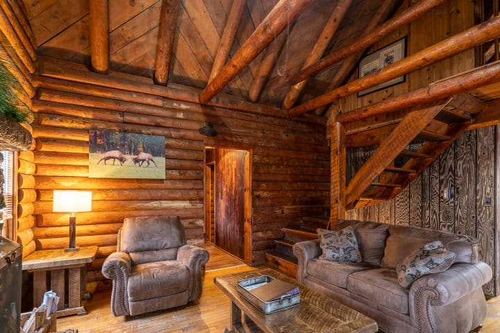 The Mills Cabin is a terrific basecamp for adventure with family or friends, with its large living area with woodburning fireplace.