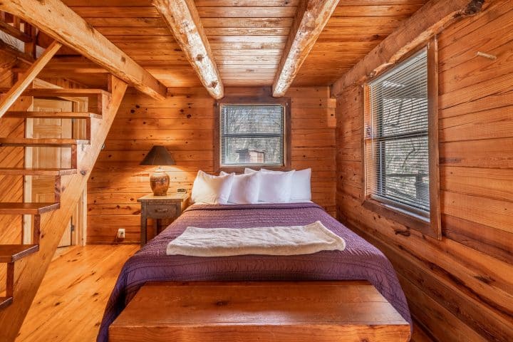 The queen bed in Cabin 4