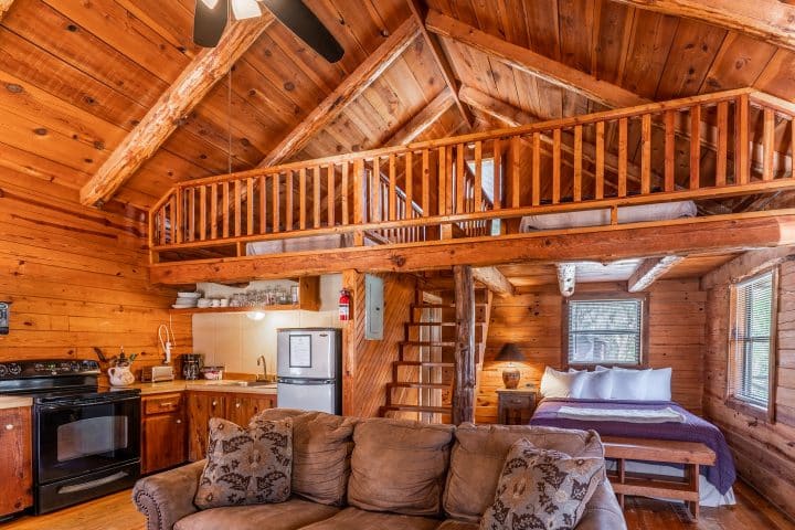 Relax in the cozy comfort of Cabin 4's living area after a full day of outdoor adventure.