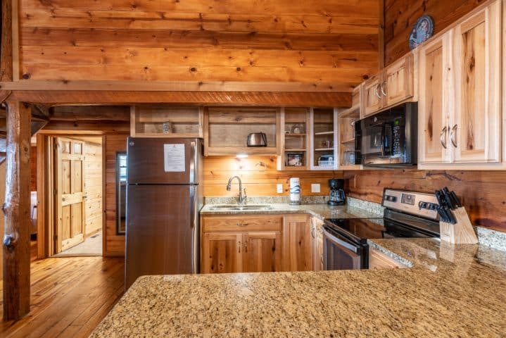 The spacious fully-appointed kitchen of the Windridge Cabin makes group meal prep a snap!