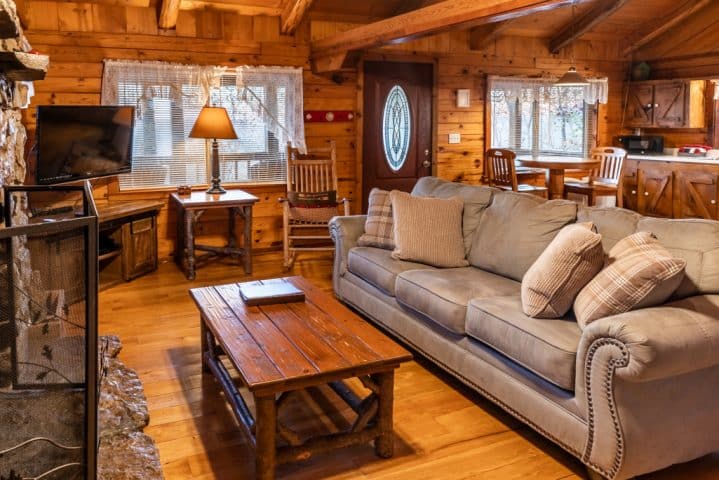 Kick back in the cozy comfort of the Mountain Magic Cabin and its woodburning fireplace.