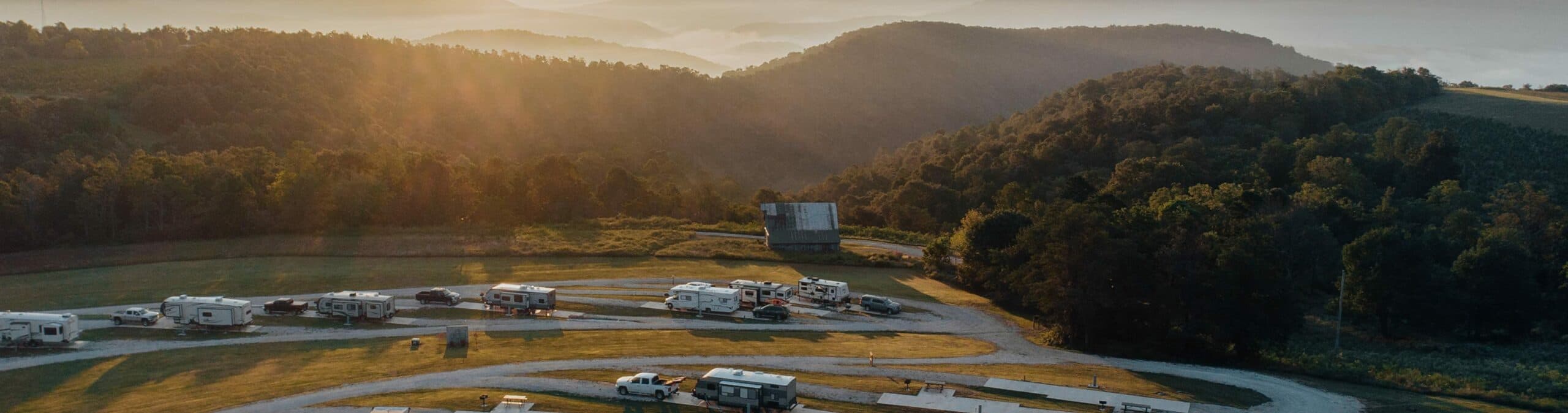 aerial of rv park at sunset