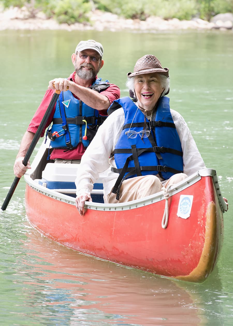 two adults canoeing