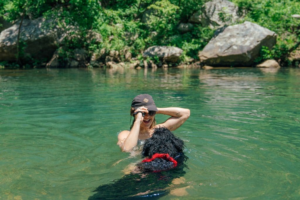 Dog and floater taking a swim in the Buffalo River.