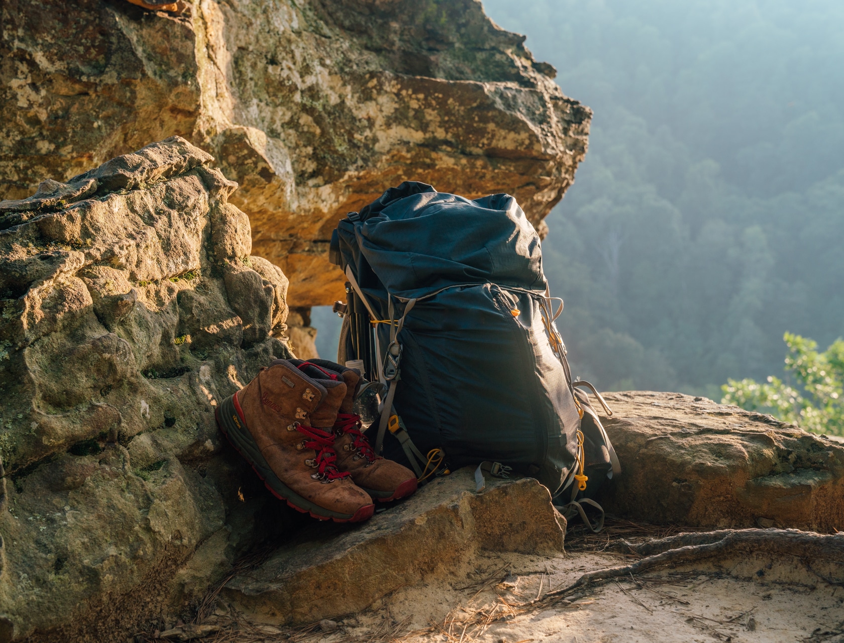 Shoes and backpack on cliffside in upper buffalo wilderness.