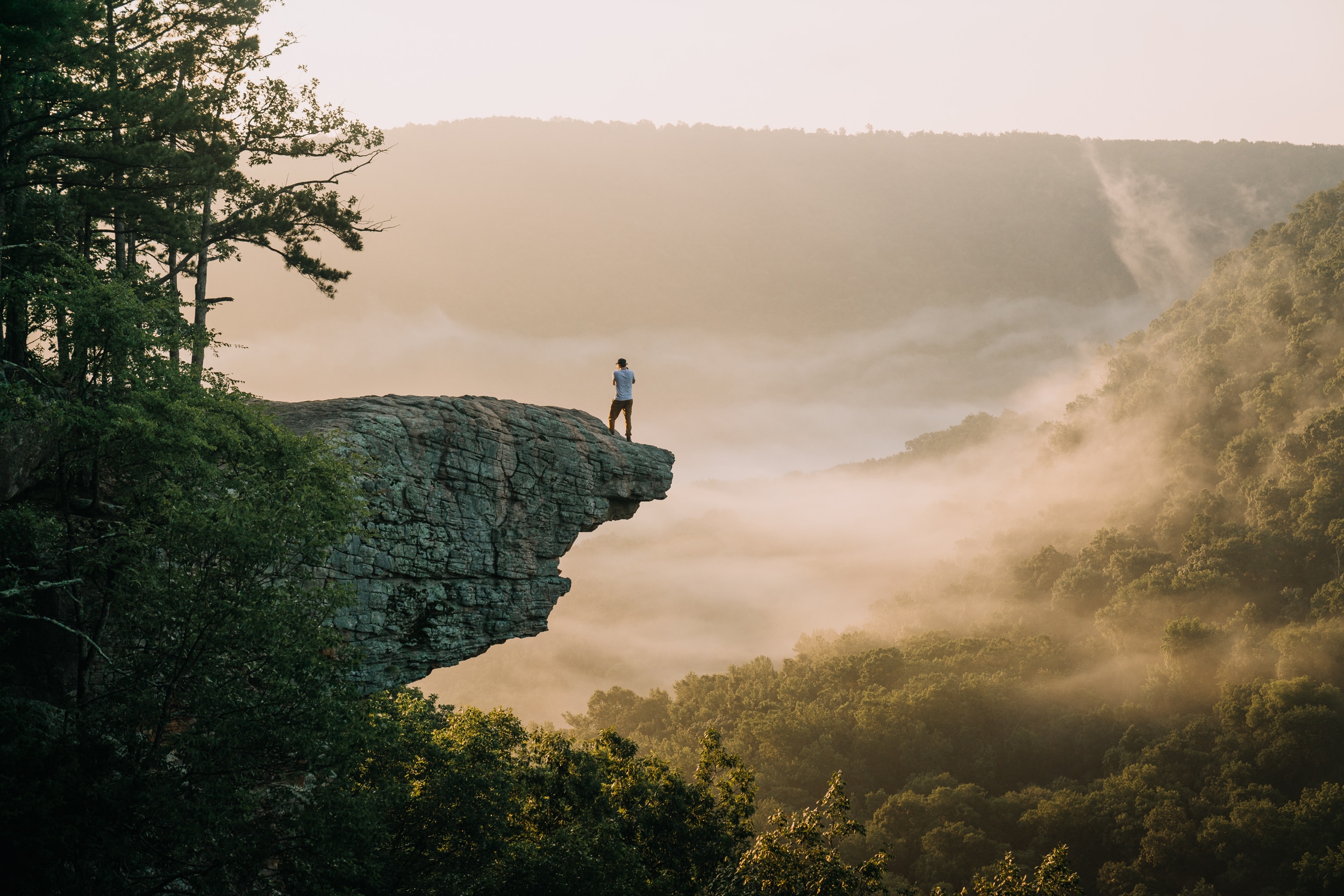 Hiker on Whitaker Point (Hawksbill Crag)