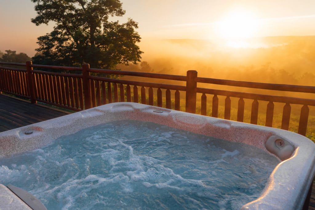 Sunset view from the hot tub of the Mountain Sunset Cabin.