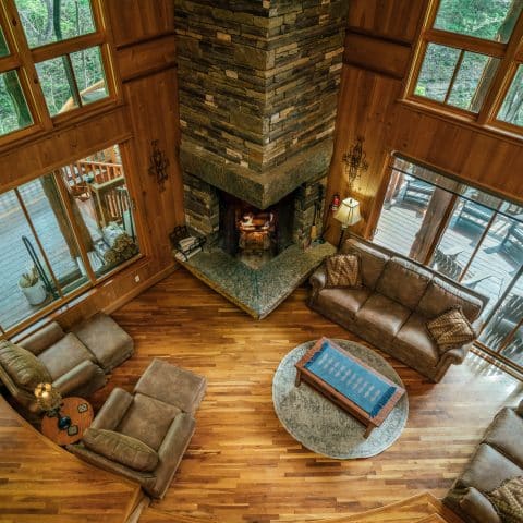 Ponca Creek Lodge features a gorgeous, open living area with a fantastic nativestone fireplace as its focal point.